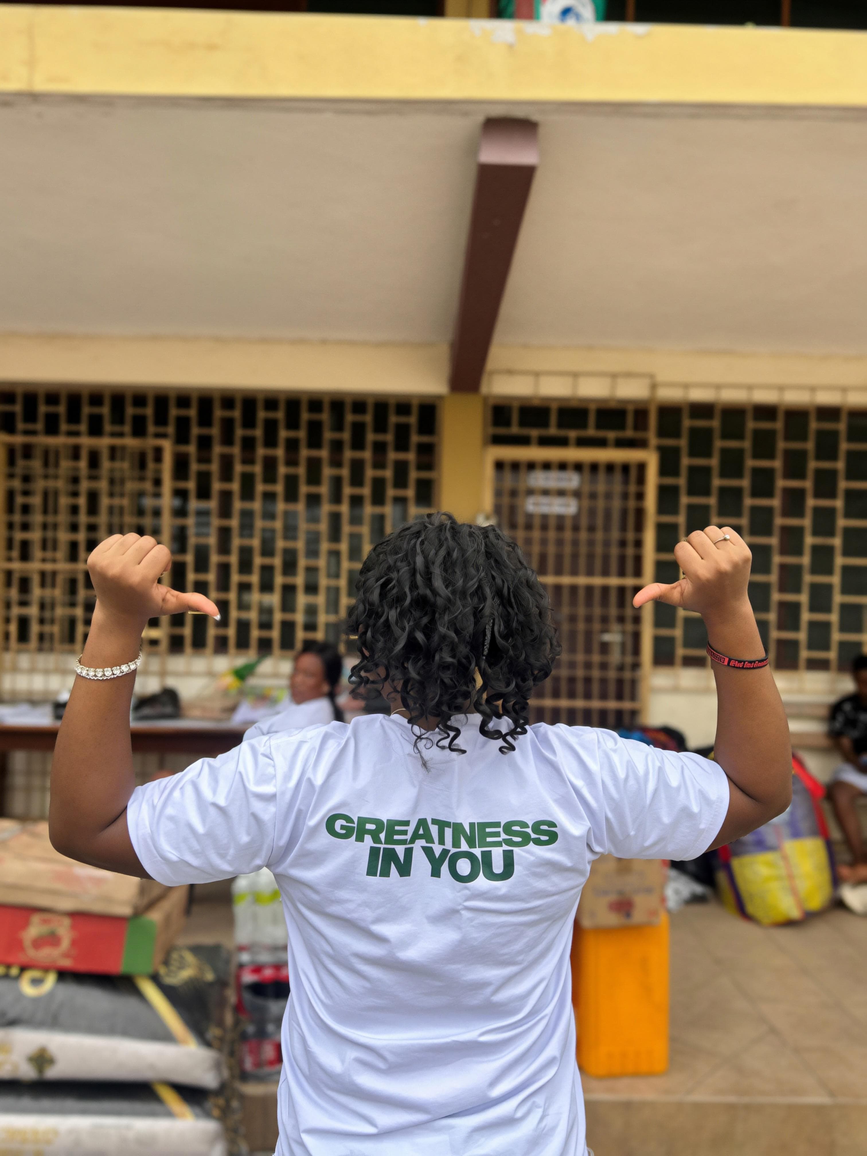 Ama Judith engaging with children at Osu Children's Home