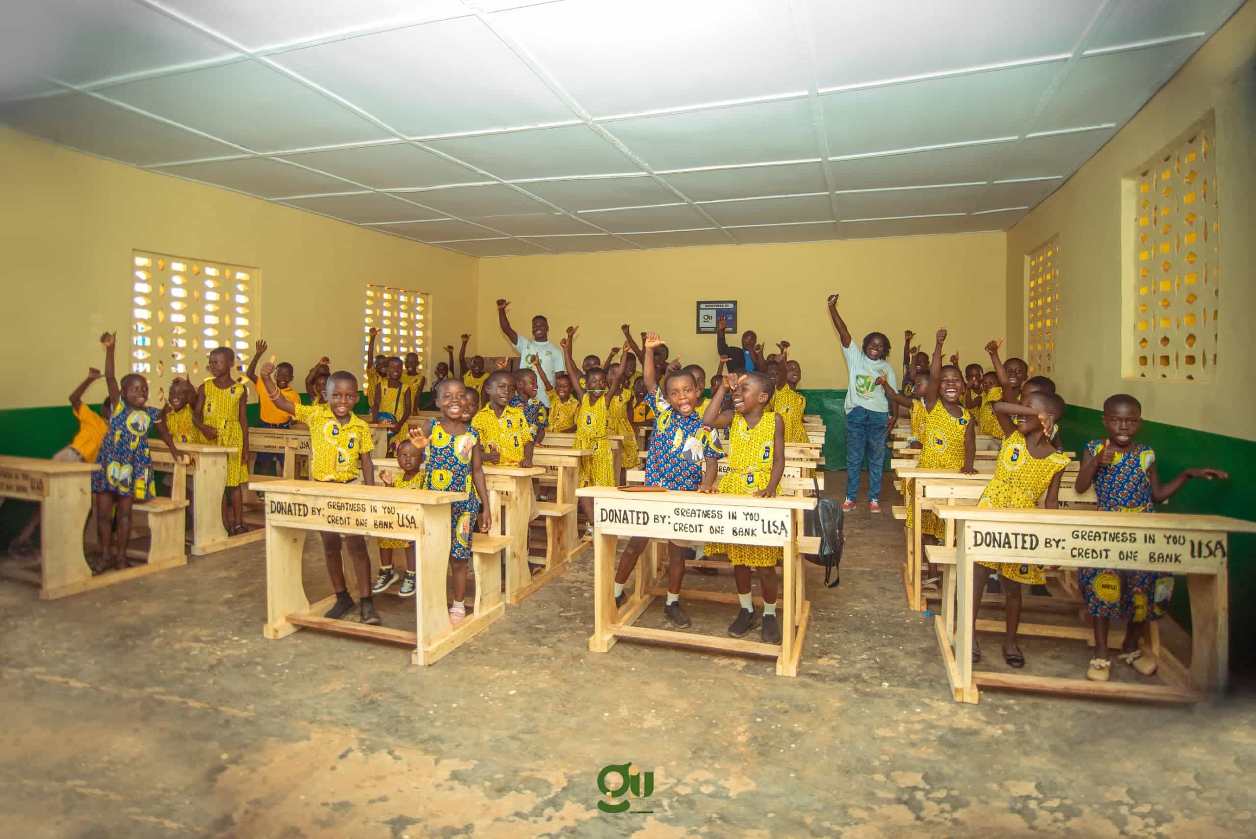 GIU students celebrating in renovated classroom