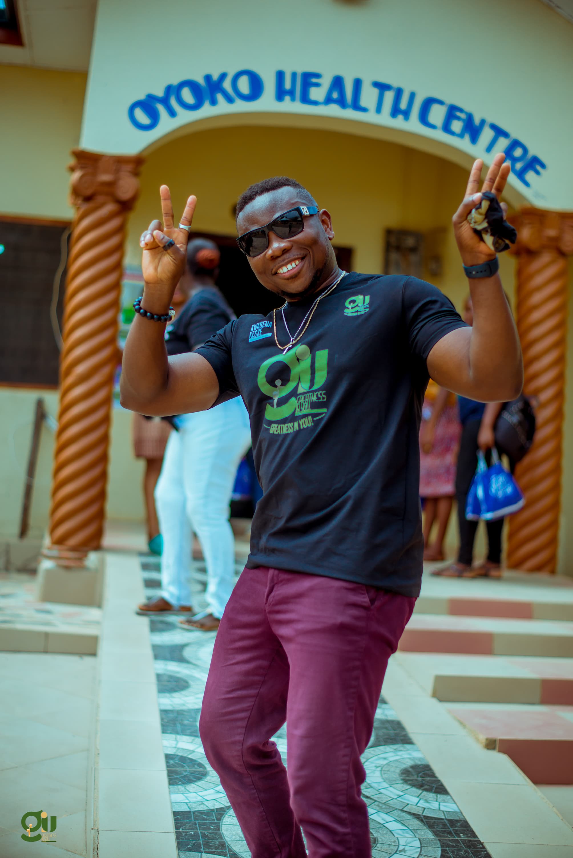 Full GIU team standing in front of Oyoko Health Centre after donating a 7.5 KVA generator