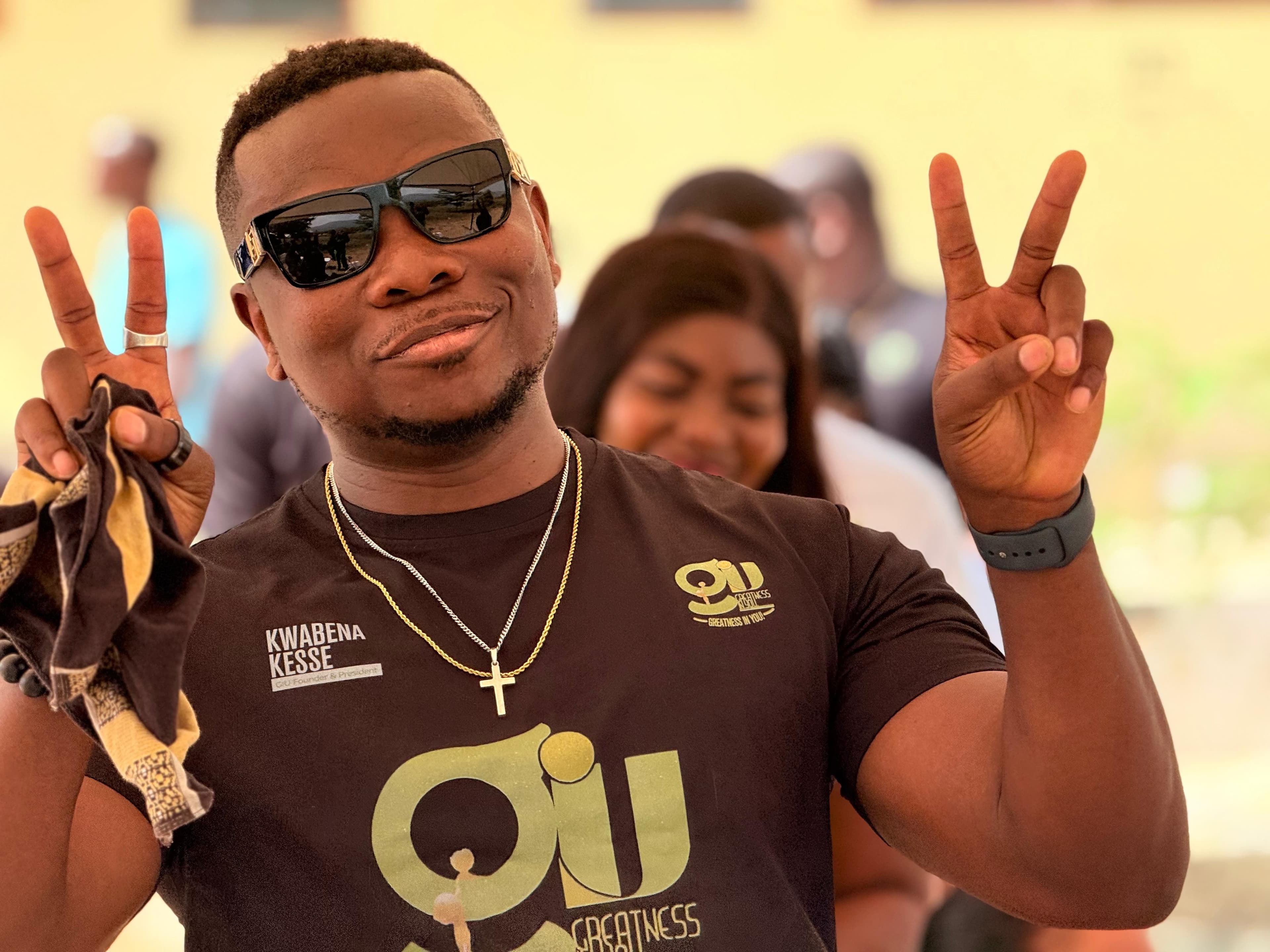 Students playing flag football at a GIU youth sports event in Ghana