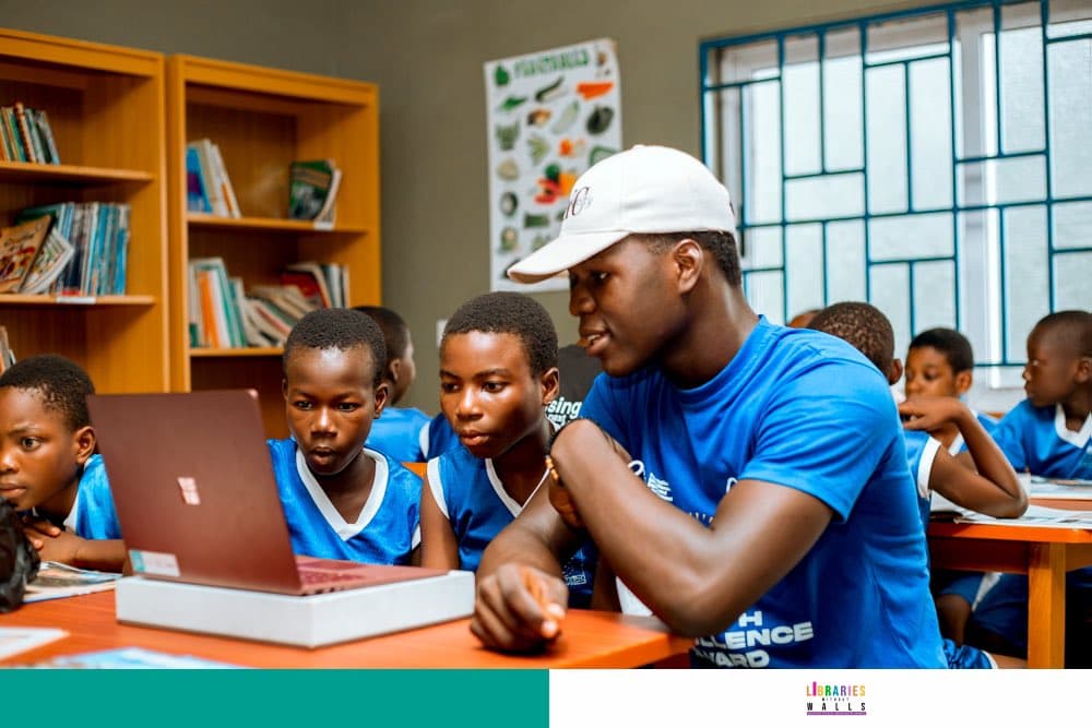 GIU Innovation Center — students with donated laptops in Ghana