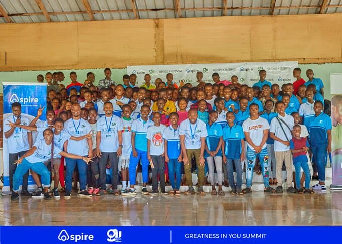 Students reading books at the GIU Tree Library in Ayikuma District