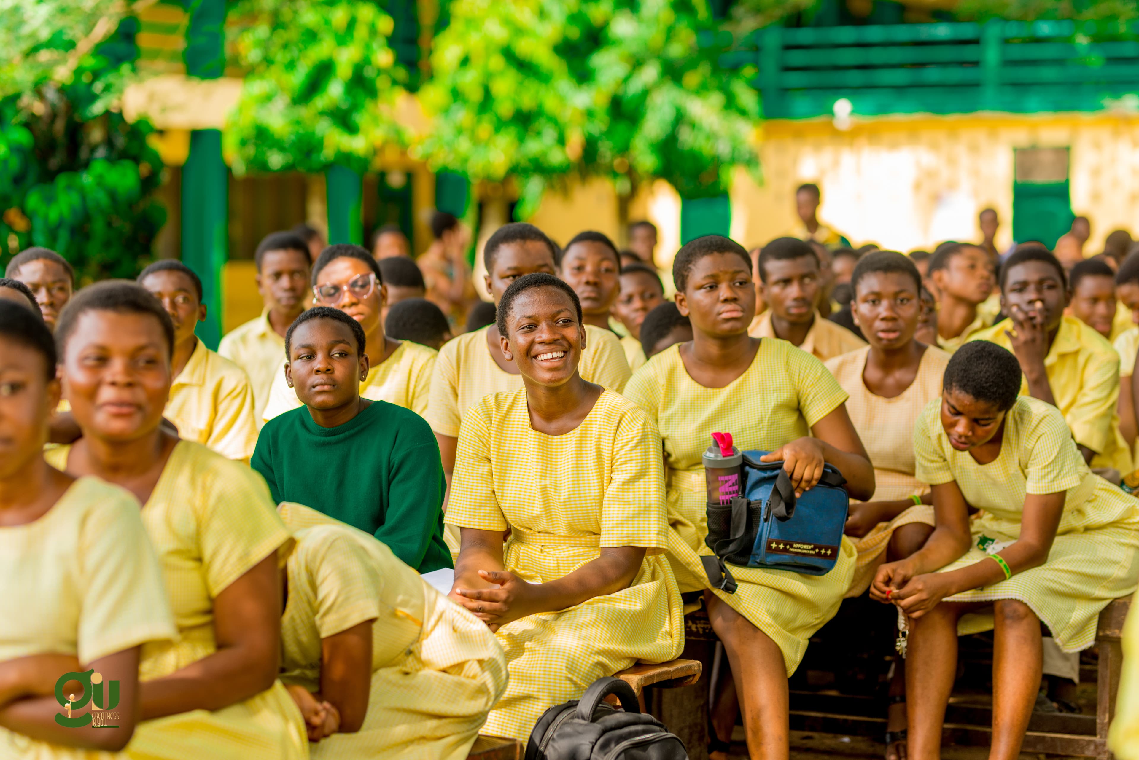 Students smiling at GIU motivational event at Ghana Secondary Senior High School